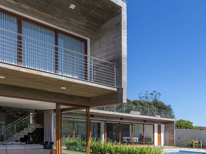 A Modern House with a Palette of Wood, Concrete, Stone and Steel in Maringá, Brazil by Grupo Pr (11)