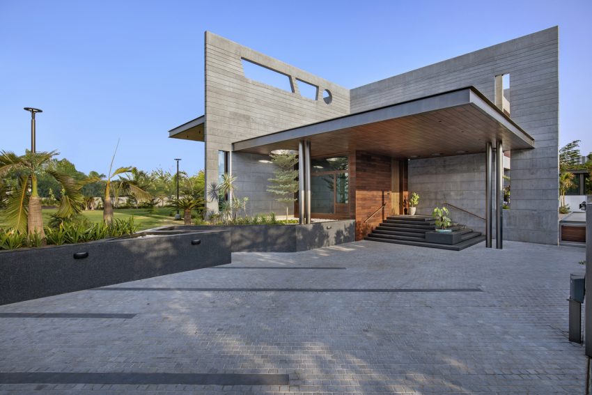 A Stunning House of Folded Concrete and Wooden Louvers in Vadodara, India by Dipen Gada and Associates (1)